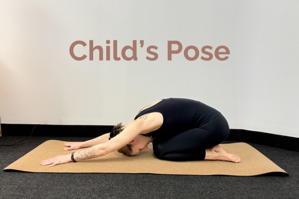 Marissa Perrotta registered dietitian and Yoga Teacher demonstrates pose 3 of 5 for Yoga for digestion, childs pose.